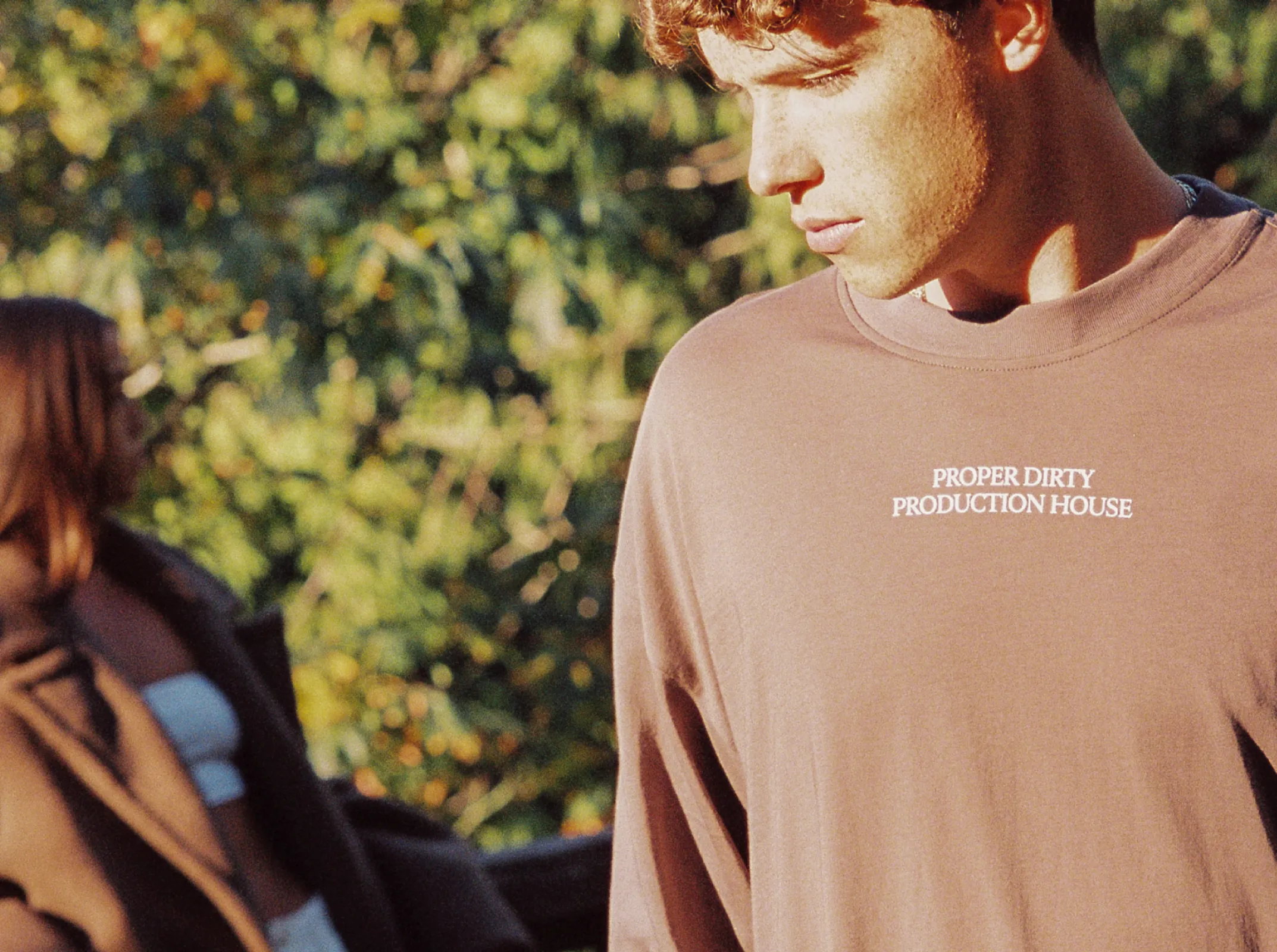 Portrait of a man in a brown sweatshirt